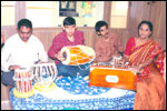 Smt Vijaya Lakshmi, Music Teacher giving lessons at the Group Residential Home “LEKHA SAMARTH”, click here to see large picture.